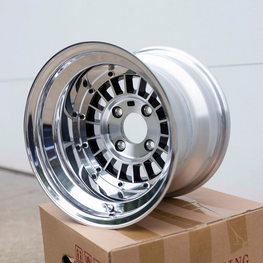 Chrome rim on a cardboard box with 'Focus Racing' branding.