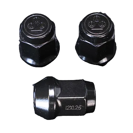 Three black metal hex nuts on a dark background